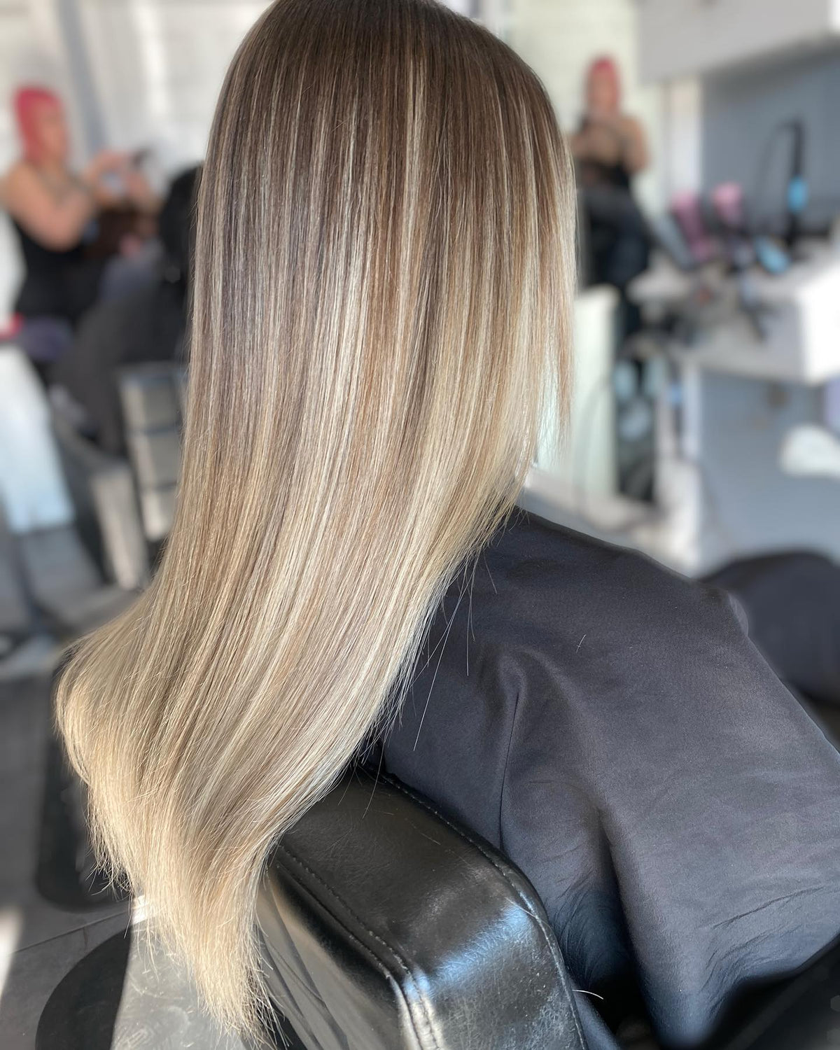 Rooted blonde balayage blown out sleek and straight at Plush Salon & Spa, Oakdale PA