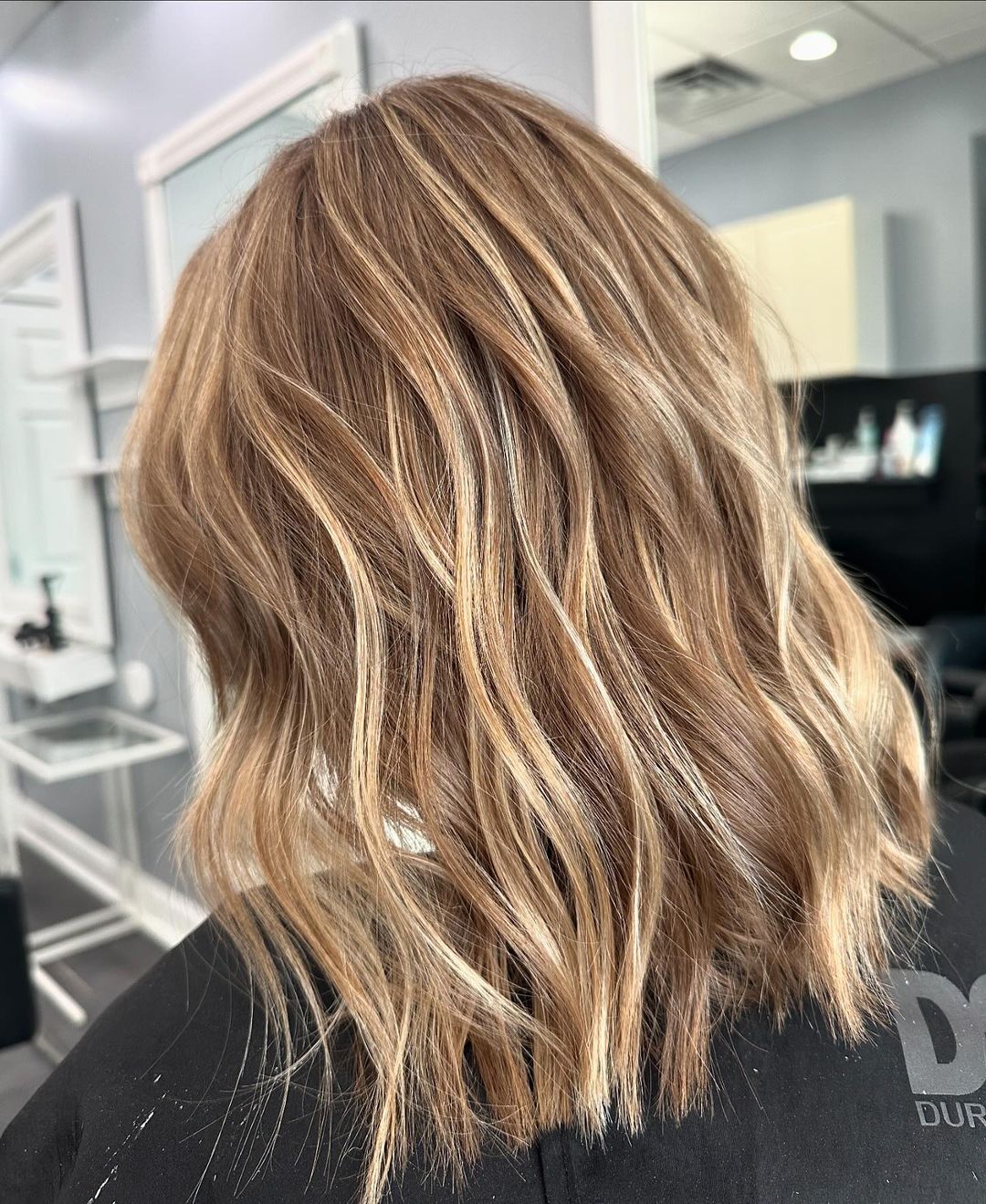 Honey balayage on a textured mid-length lob at Plush Salon & Spa, Oakdale PA