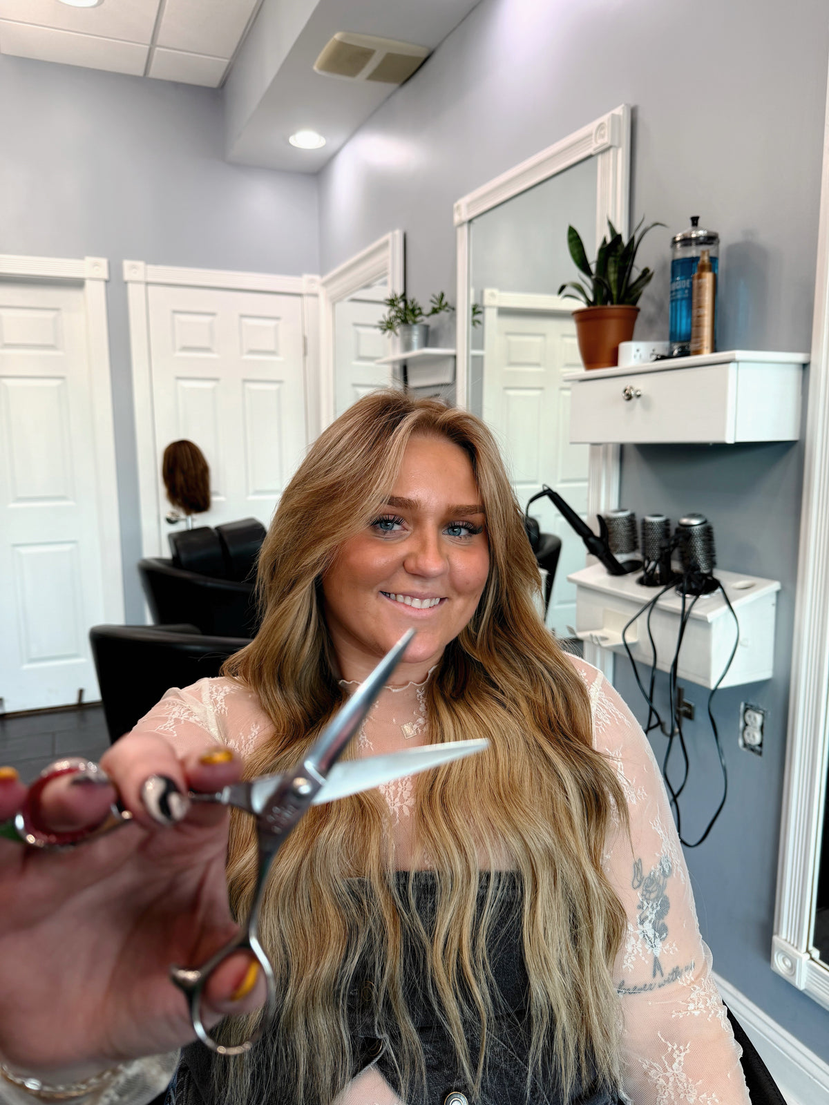 Level 4 stylist Tiffani with long dimensional blonde hair at Plush Salon & Spa, Oakdale PA