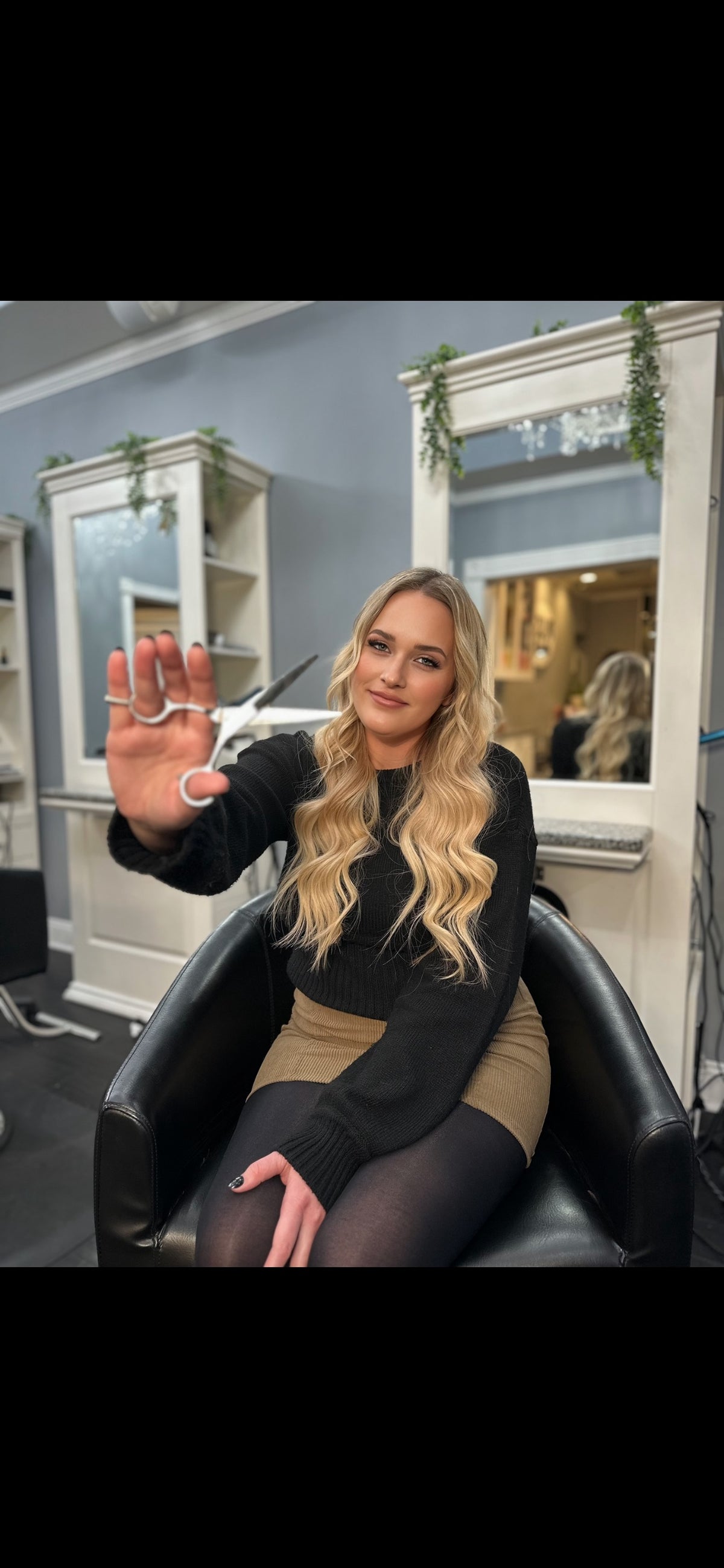 Stylist Amanda holding shears at Plush Salon & Spa, Oakdale PA