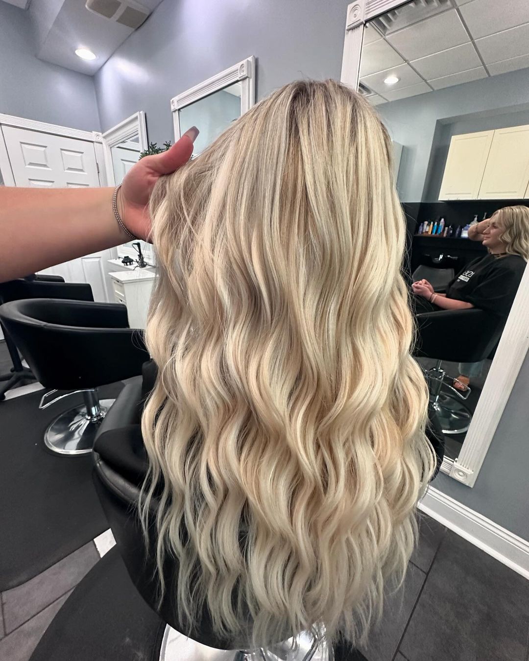 Bright blonde with a shadow root styled in beach waves at Plush Salon & Spa, Oakdale PA